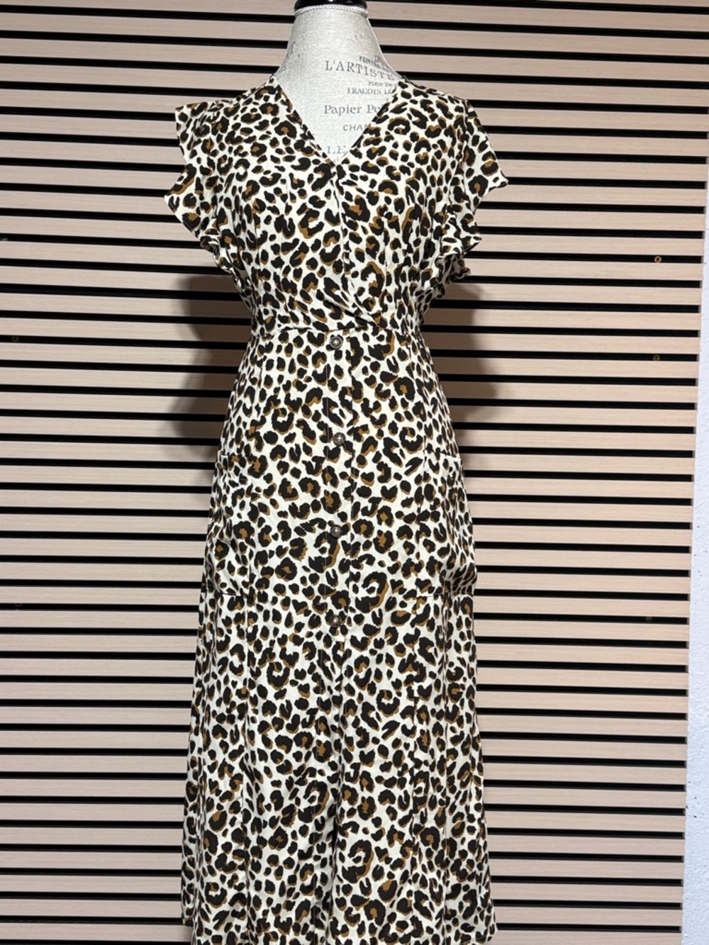 Sienna Sky Leopard Print Wrap Midi Dress in Cream, Brown, and Black